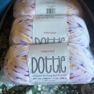 Premier Dottie Yarn in White with Purple and Yellow Accents Color is Pansies
